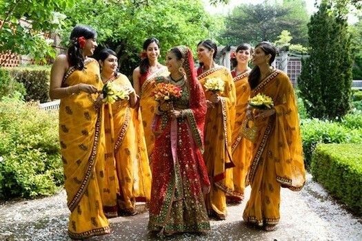 Bridesmaids in marigold yellow at Indian wedding