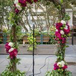 Floral Arch with Lush Greens, Hot Pink and Fuchsia Roses - Shelby and Jonathan NYC Wedding - Bryant Park Grill - Photo by Craig Warga Photography