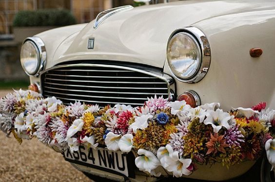 Italian Wedding Car Flowers via Whimsical Wonderland Weddings / Aynhoe Park / Alexa Loy Photography