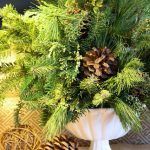 Fresh Green Christmas Flower Arrangement with Pine Cones - via StoneGable