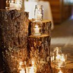 Rustic Candle Display on Tree Stumps - Wedding Decor - by Jodi Miller Photography - via Bridal Guide