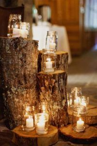Rustic Candle Display on Tree Stumps - Wedding Decor - by Jodi Miller Photography - via Bridal Guide