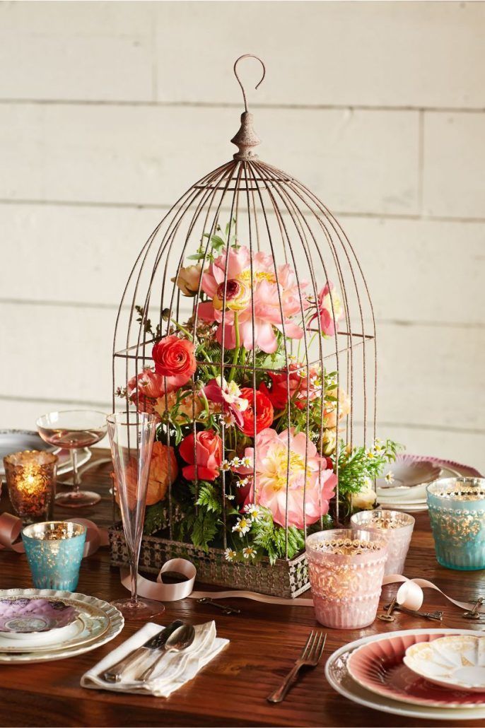 Colourful Floral Birdcage Centerpiece - Photo by Maven Bride - via Table Decorating Ideas.com