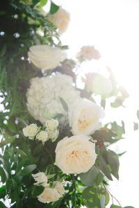 Mary & Galen Wedding - Ceremony Arch -Detail - White Rose - White Spray Rose - Hydrangea and Greenery - The Hudson Hotel NYC -Photography by Jac and Thom