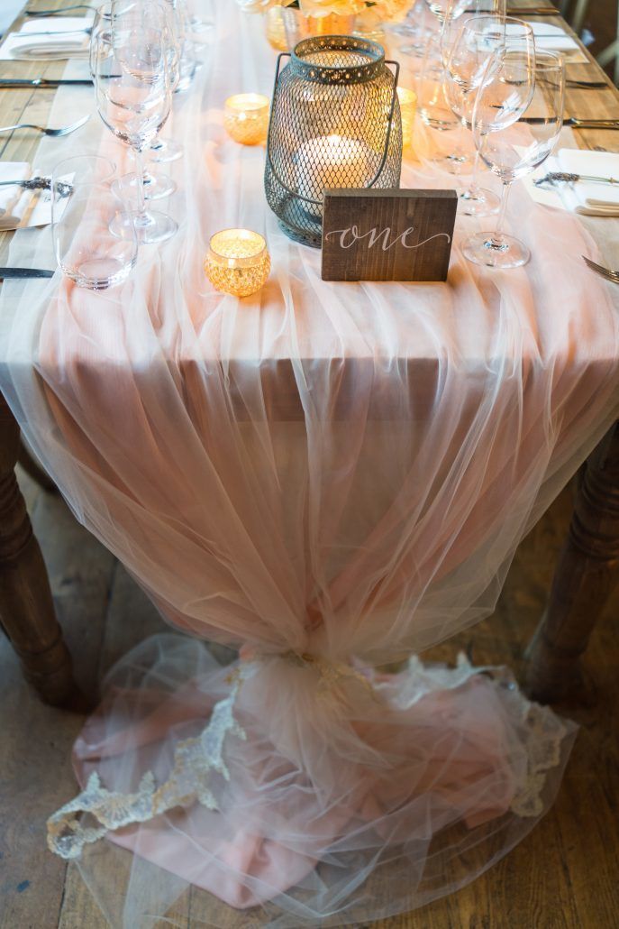 Lauren and Jordan Wedding - Blush Tulle Table Runner with Mercury Votives and Lanterns - Blue Hill at Stone Barns NY - Photography by Craig Paulson