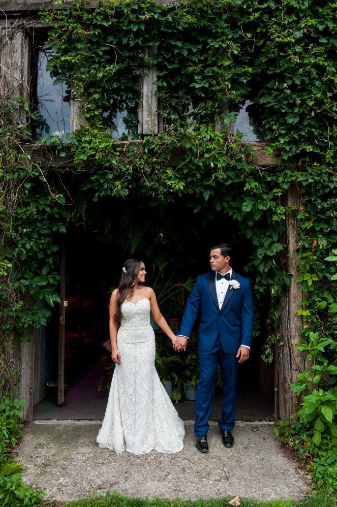 Lauren and Jordan Wedding - Bride and Groom Holding Hands - Blue Hill at Stone Barns NY - Photography by Craig Paulson