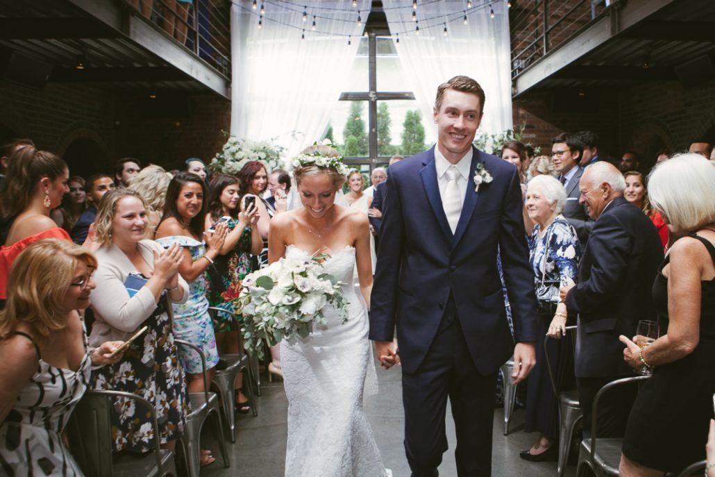 Christina & Derek Wedding - Groom and Bride Walking Down Aisle - The Foundry LIC - Kevin Markland Photography