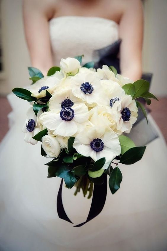 Anemone - Winter Wedding Bouquet - via weddingforward.com
