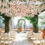 Mary & Galen Wedding - Hanging pink carnations and Ceremony Arch - The Hudson Hotel NYC - Photography by Jacqueline Pierson Weddings