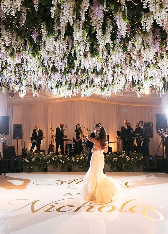 Floral Canopy - Photo by Victor Sizemore Photography - via modweddings.com