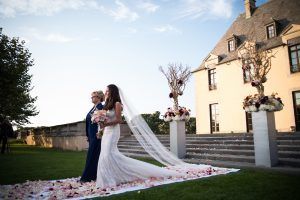 Kaitlyn & Thomas Wedding - Bride Walking Down Aisle - Oheka Castle - by Susan Stripling - 292