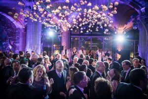 Madalyn & Jonathan Wedding - dance floor floral chandelier - Guastavino's - by Joshua Zuckerman