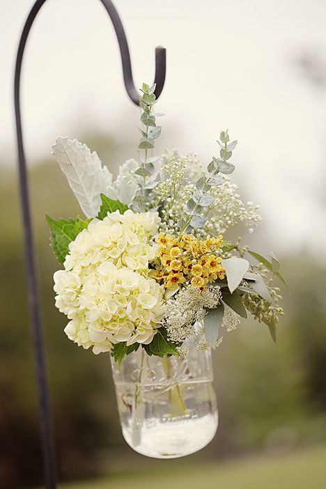 queen anne's lace chair arrangement - via dylanlucyweddings.com